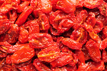 Many dried tomatoes as background