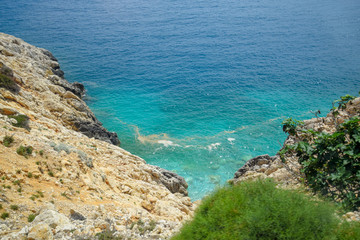 coast of the Mediterranean Sea. The shore is composed of limestone and marble.