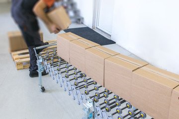 worker at product packing factory line