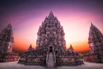 Beautiful sunset at Prambanan (Hindu temple) in Yogyakarta, Java, Indonesia - obrazy, fototapety, plakaty