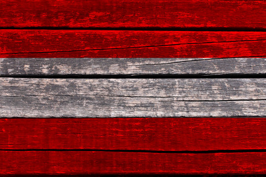 photograph of the beautiful colored national flag of the modern state of Austria on textured fabric, concept of tourism, economics and politics, close-up