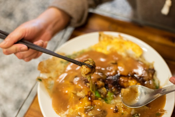 at traditional Taiwanese snack of oyster omelet