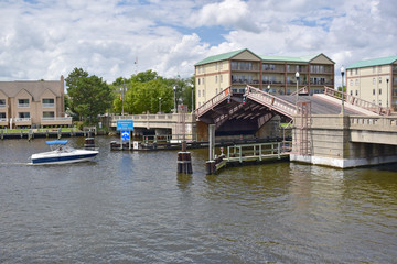 A boat approaches a drawbridge on the Choptank river in Cambridge MD.