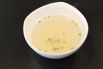 White cup with immersing water for quenching