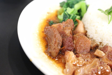 Stewed pork leg with rice and vegetable