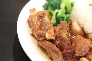 Stewed pork leg with rice and vegetable