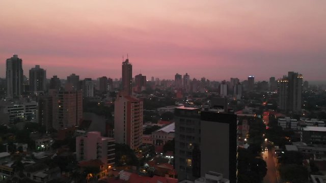 Skyscrapers, Buildings, Sunset (Asuncion capital of Paraguay) aerial view