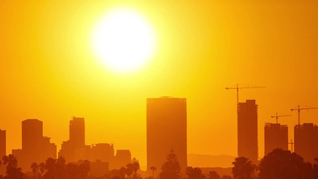 Time Lapse of the sun rising from behind downtown Los Angeles
