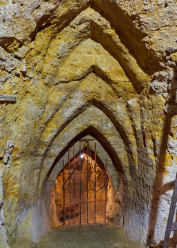 Vertical front view of unique visigoth arches in the arab caves labyrinth built under the medieval city of Brihuega, Guadalajara, Alcarria, Castilla la Mancha, Spain