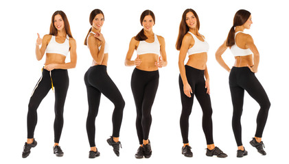 Obraz premium Sexy fitness woman posing in studio - isolated on a white background