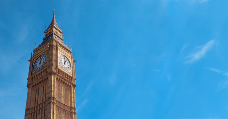 Big Ben Clock Tower in London, UK, on a bright day, panoramic image