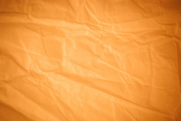 Brown crumpled paper background.