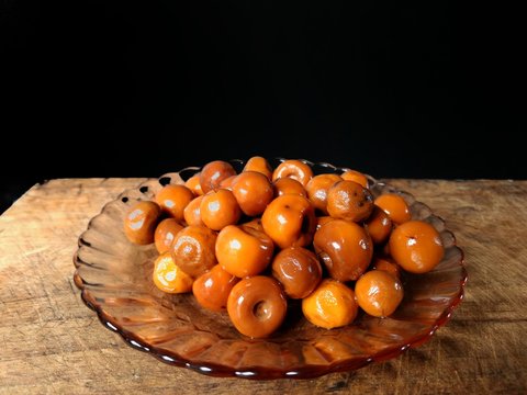 Sweet nanche on black background. Typical sweet from Guatemala. food concept