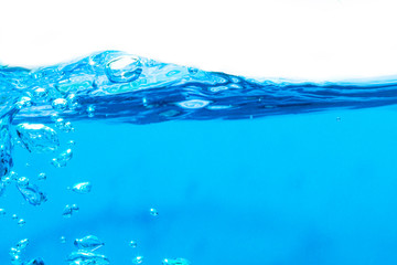 blue water waves with with bubbles on a white background