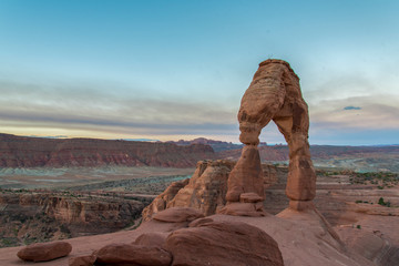 Fototapeta na wymiar Sunrise over Delicate Arch in the Very Early Morning in Arches National Park, Utah, USA
