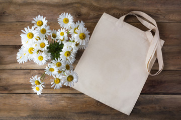Fototapeta Rustic tote bag mockup with daisy obraz