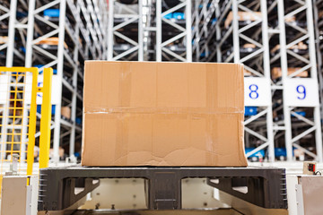 The warehouse full of goods, boxes and shelves in order. Industrial background container plant manufacturing manufacture production paperboard business deal