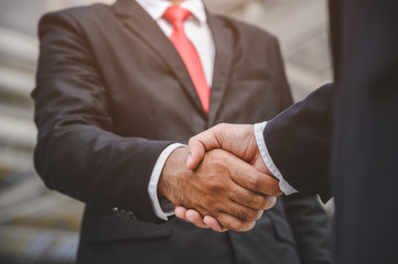 Business people shake hands To make a business proposal agreement Went well