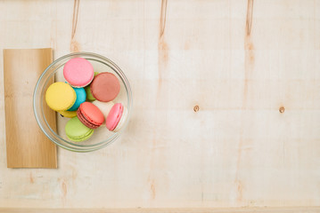 The background is full of macaroons.