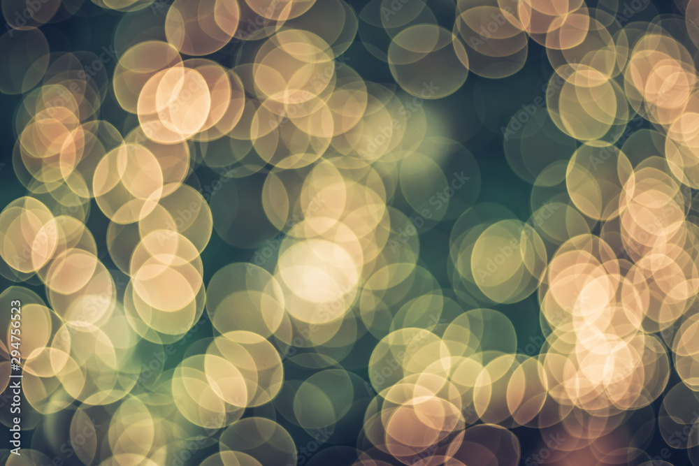 Poster Abstract blur decoration ball and light string on christmas tree with bokeh light background.winter holiday seasonal