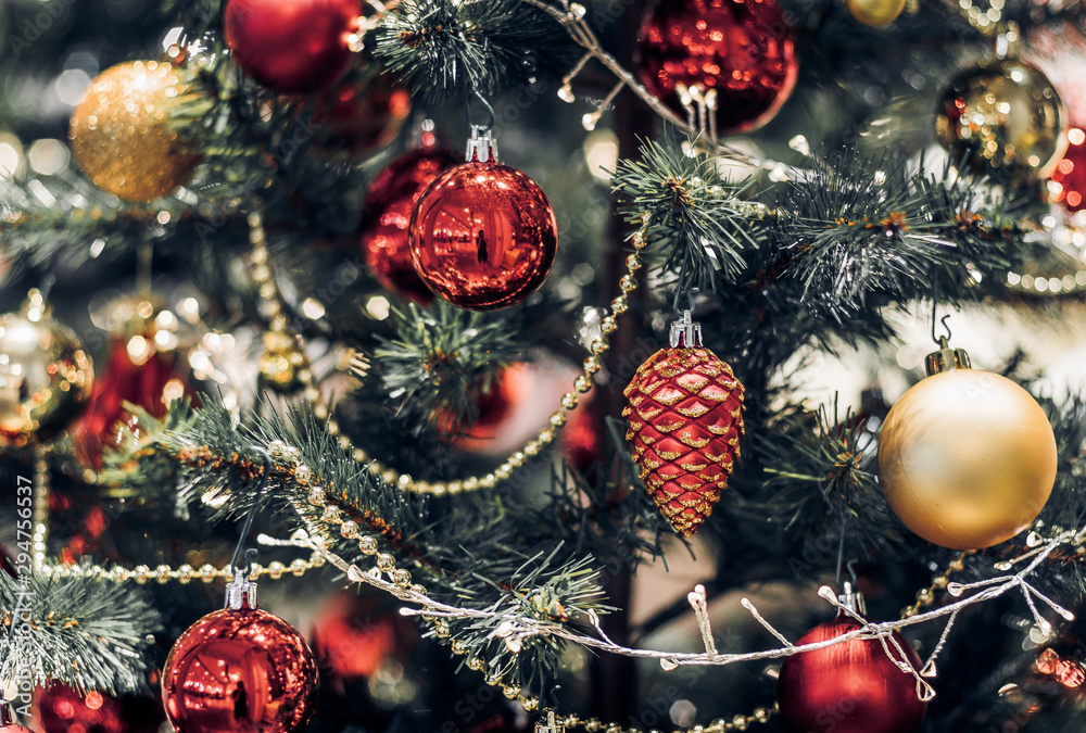 Aufkleber Abstract color blur decoration ball and light string on christmas tree with bokeh light background.winter holiday seasonal