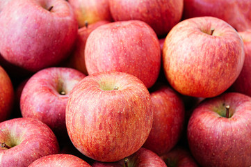 Fototapeta na wymiar Fresh red Fuji apple, pile of Aomori Ringo in fruit season