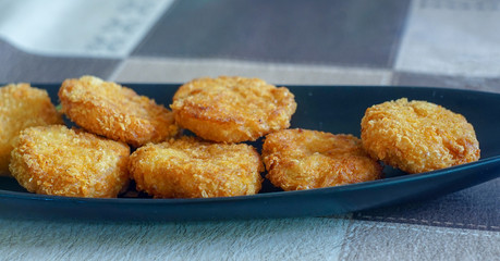 chicken nugget with film tone on the table.