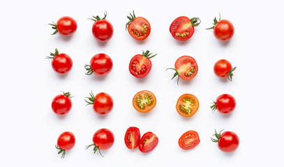 Fresh tomatoes, whole and half cut isolated on white background.