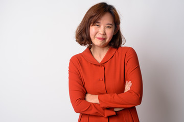 Obraz premium Portrait of beautiful Asian woman with arms crossed