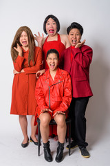 Fototapeta premium Group of diverse Asian friends looking scared and shouting together