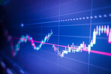Blue stock exchange market graph on LED screen for business analysis. Finance and economic graphs.