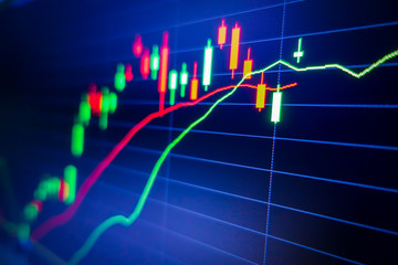 Blue stock exchange market graph on LED screen for business analysis. Finance and economic graphs.