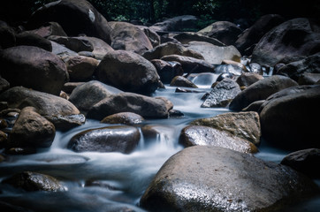 Long exposure shots of stream with cascades.