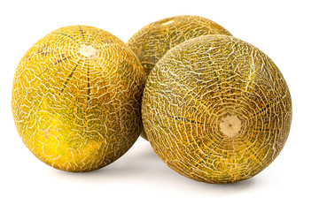 Group of three whole fresh melon cantaloupe variety isolated on white background
