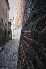 A narrow street among tenements of the old town