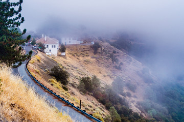 Fog covering the slopes of Mt Hamilton, the highest peak in the Diablo Mountain Range and the...