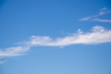 White clouds in the blue sky during the day