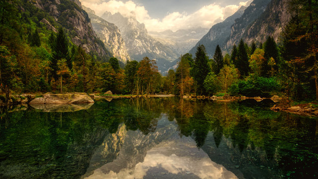 lake in the mountains of Mello Valley, autumn season, Italy