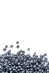 Fresh blueberries on white background with copyspace. Top view