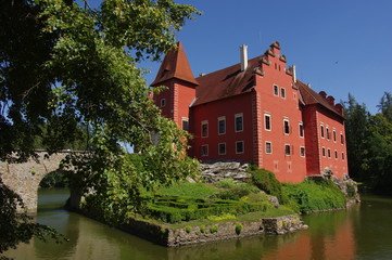 Cervena Lhota is a chateau about 20 kilometres north-west of Jindrichuv Hradec in south Bohemia, Czech Republic. It stands at the middle of a lake on a rocky island. 