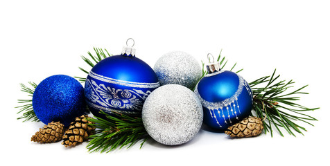 Christmas decoration blue and silver balls with fir cones and fir tree branches isolated