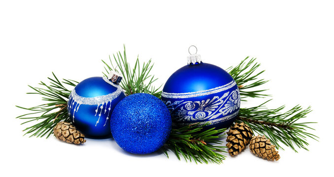 Christmas decoration blue balls with fir cones and fir tree branches isolated