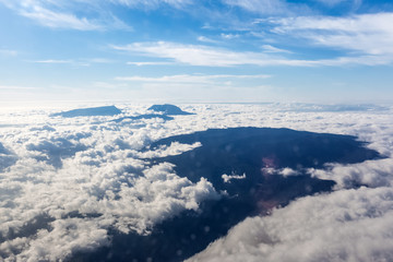 Fototapeta na wymiar aerial view from plane, mountains of Réunion Island 