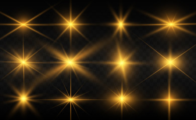 Set of gold bright beautiful stars. Light effect Bright Star. Beautiful light for illustration. Christmas star. White sparks sparkle with a special light. Vector sparkles on transparent background