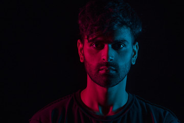 portrait of a man in red and blue	