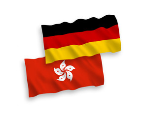 National vector fabric wave flags of Germany and Hong Kong isolated on white background. 1 to 2 proportion.