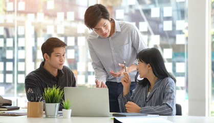 Business working in office with documents and laptop people