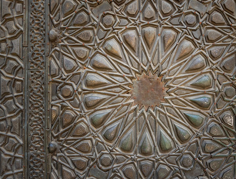 Ornaments of the bronze plate door of ancient historic mosque of Sultan Basque, Cairo, Egypt