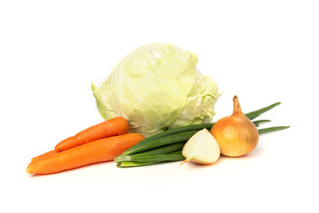 Fresh cabbage, carrot and onion isolated on white background.