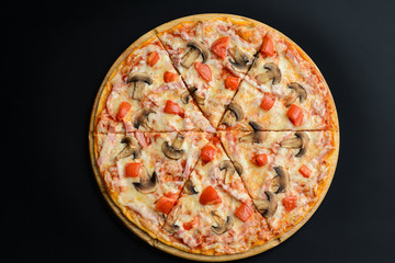 Pizza with mushrooms and ham